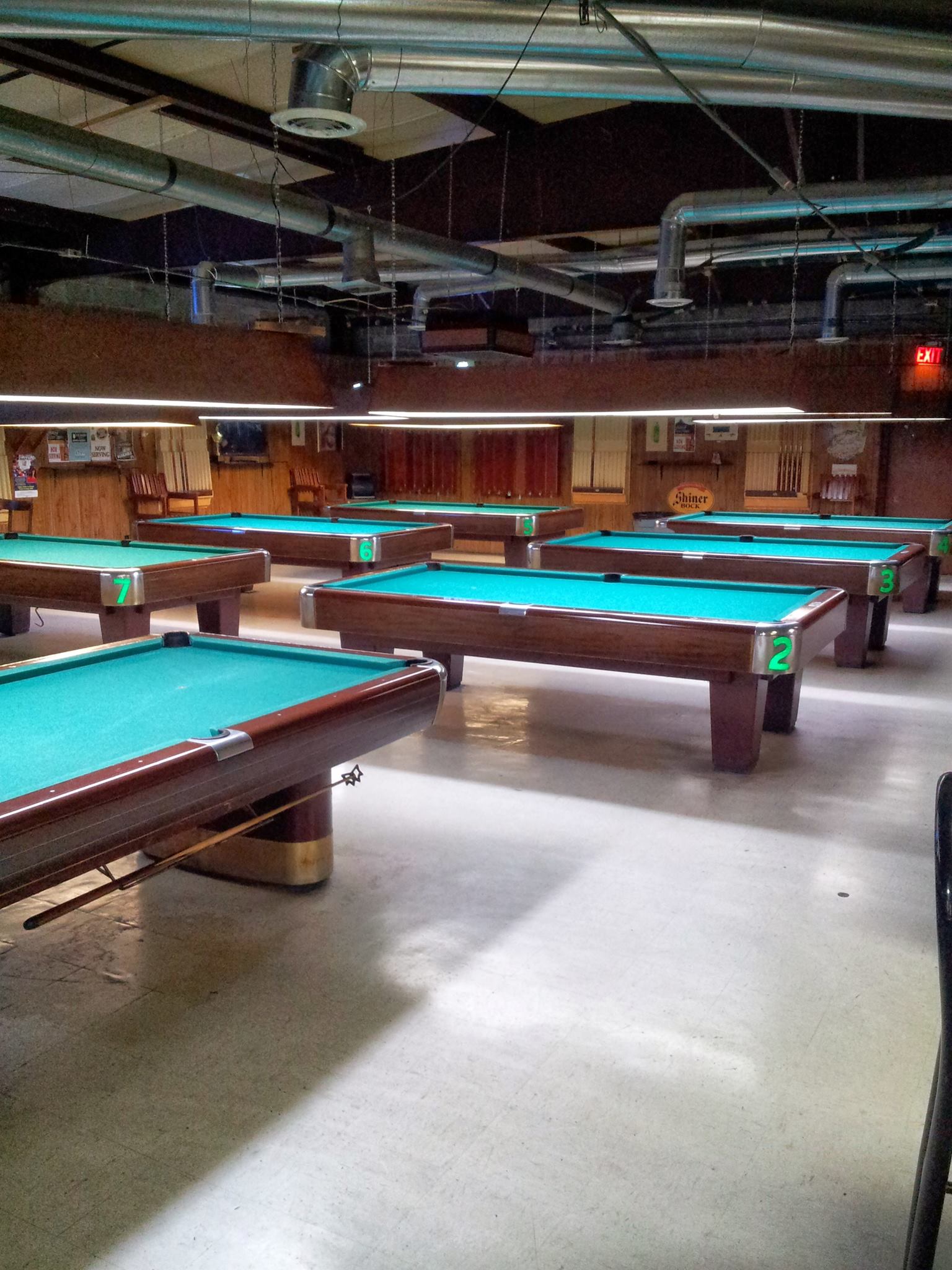Cue and Cushion Billiards pool hall exterior/interior