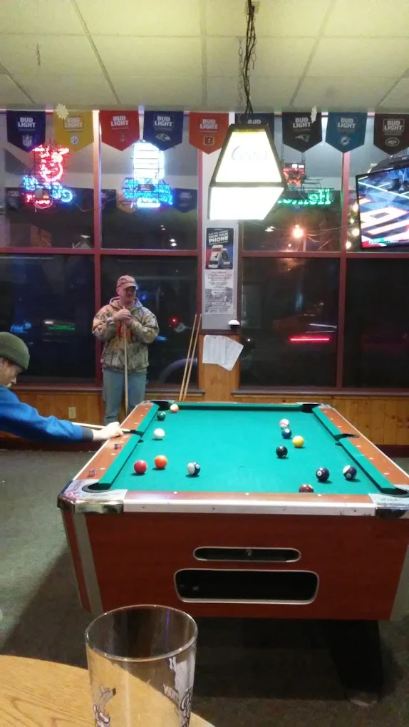 Johnny C's Sports Bar pool hall exterior/interior