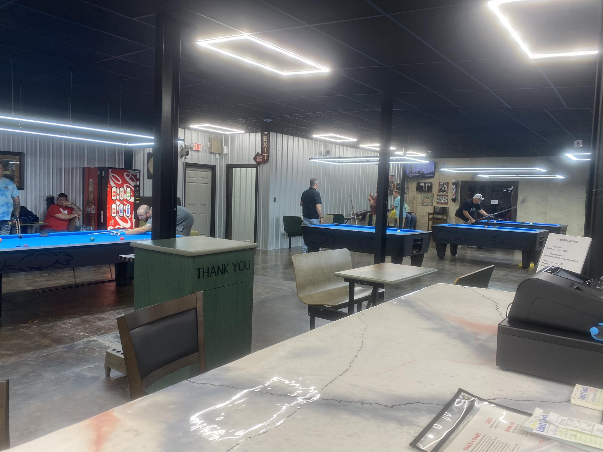 Cue Sports & Grill pool hall exterior/interior