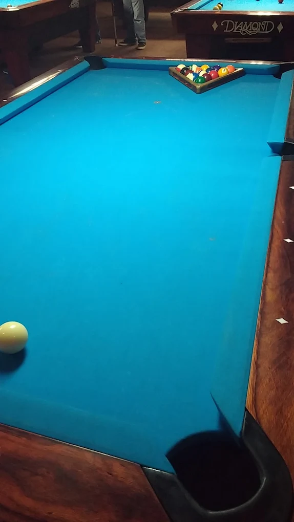 Dennis' Place pool hall exterior/interior