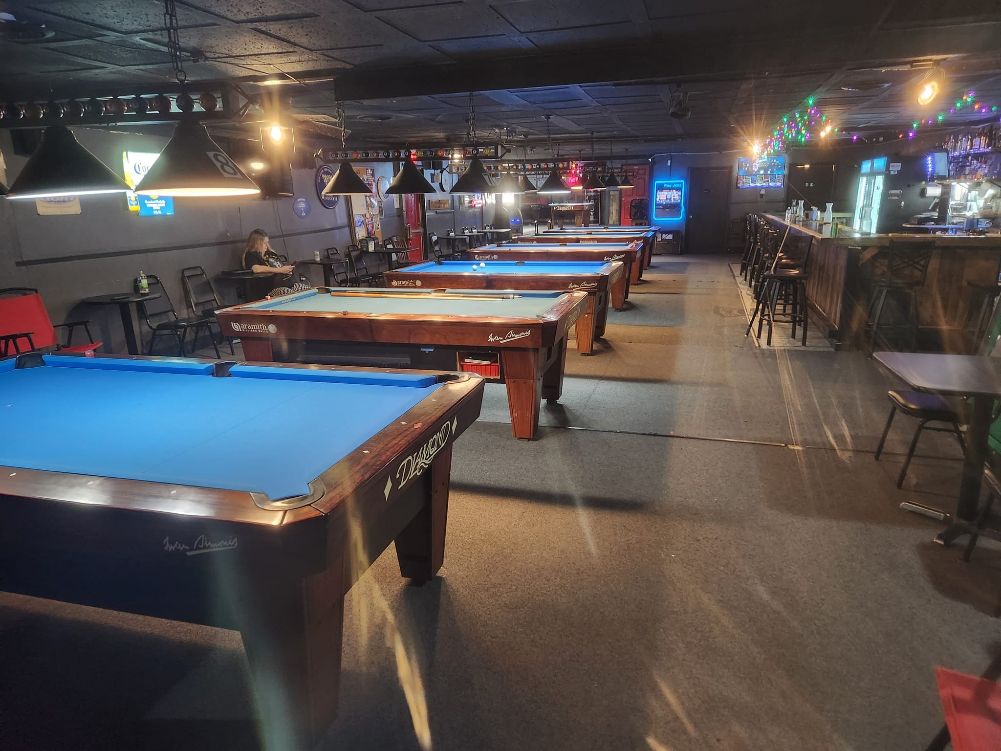 Tight Pockets LLC pool hall exterior/interior