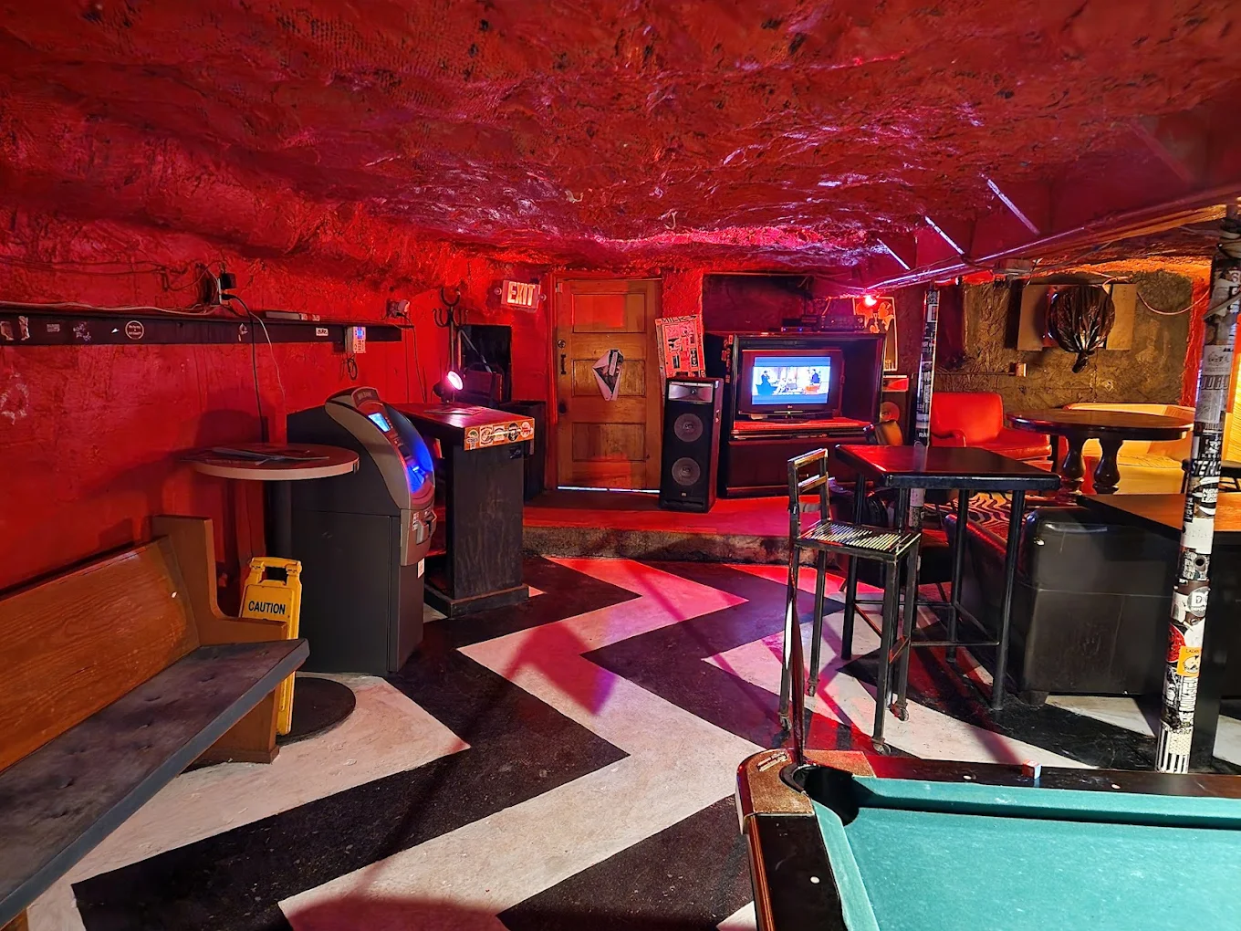 The Cave Tavern pool hall exterior/interior