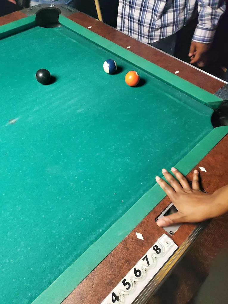 The Windbreak pool hall exterior/interior