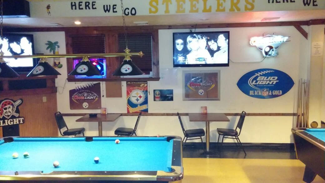 Black and Gold Tavern pool hall exterior/interior