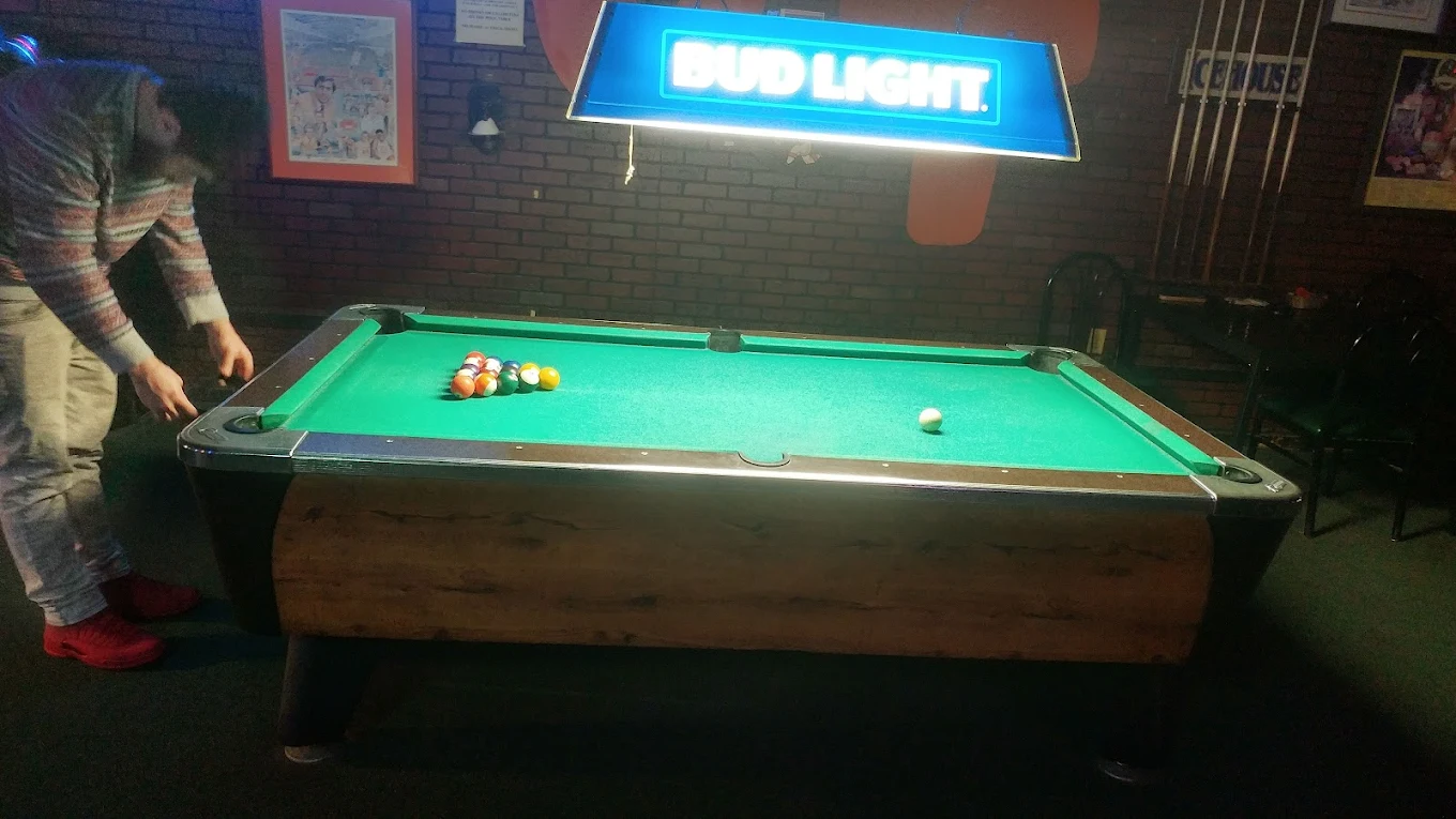 Paul's Oasis pool hall exterior/interior